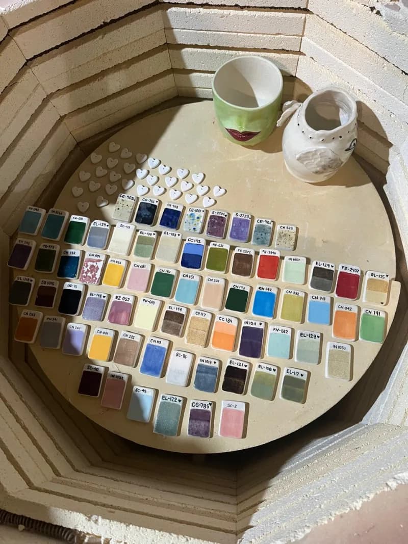 Glaze color test tiles in kiln