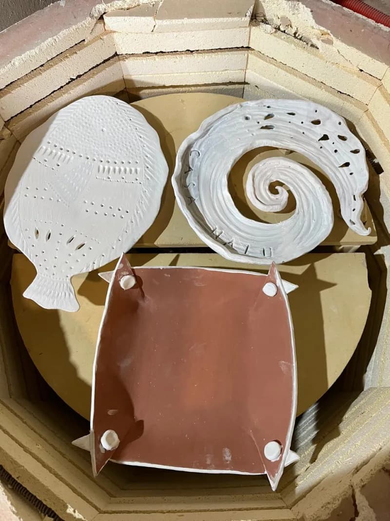Ceramic pieces in kiln before firing